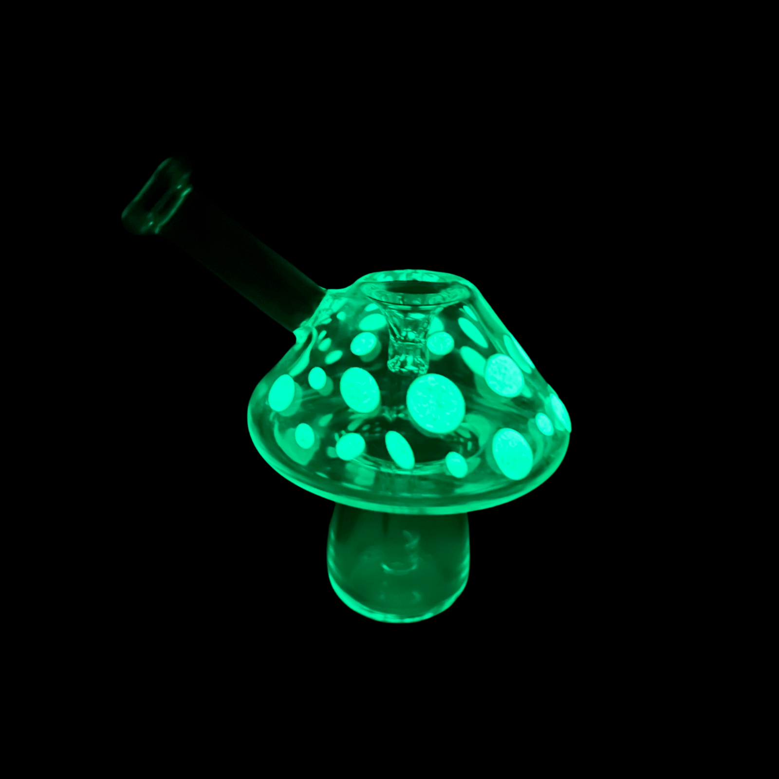 A close-up, angled view of the “Mushroom” Glow-in-the-Dark Mini Bubbler, showcasing its rounded shape and green glow.