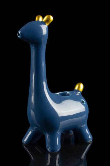 Front view of the Giraffe Hand Pipe, a sculpted ceramic piece with a glossy finish, reflected on a dark surface.