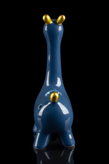 Front view of the Giraffe Hand Pipe, reflecting on a glossy black surface with a sleek, sculpted design.