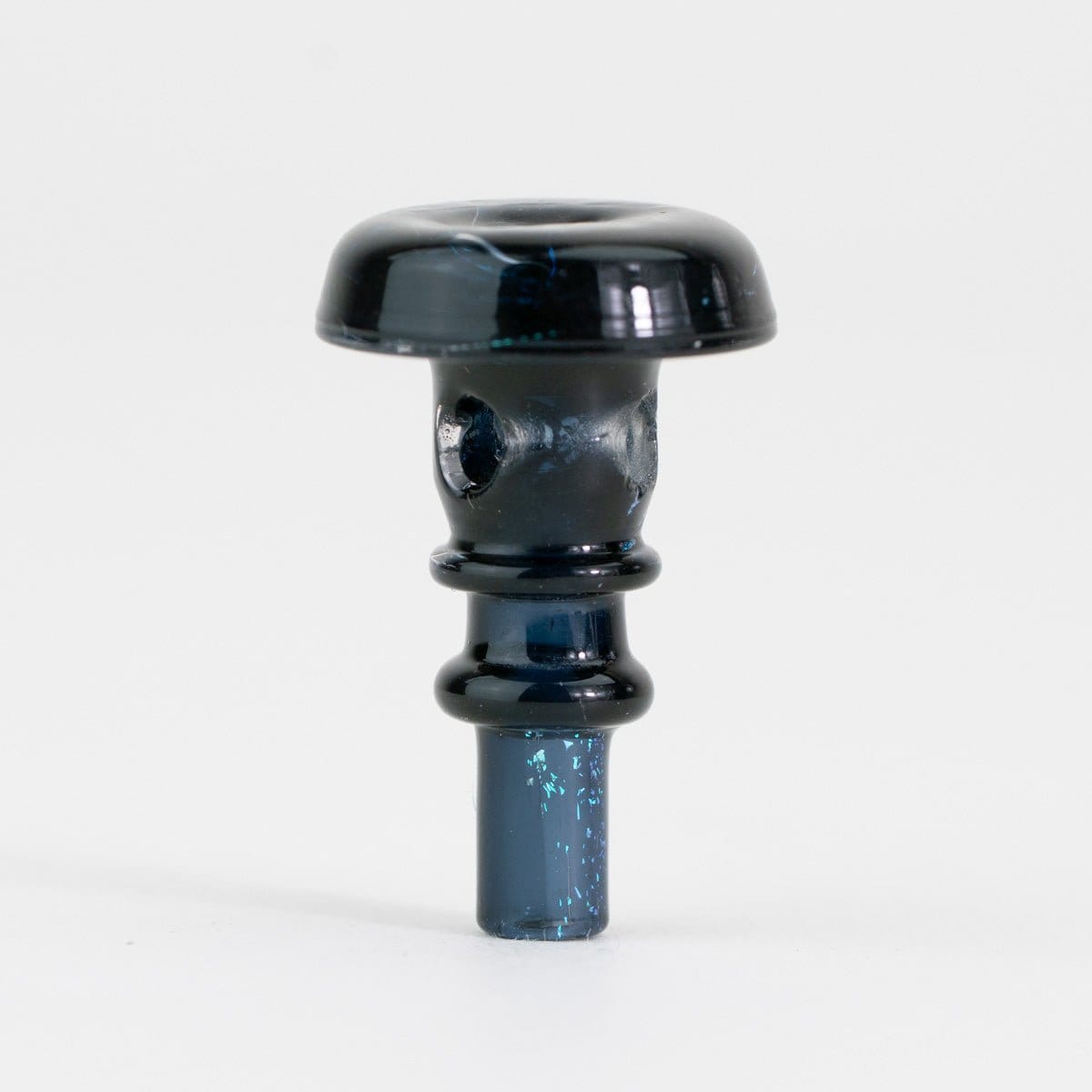 Centered close-up of the Empire Glassworks PuffCo Peak Pro 3D XL Chamber Glass Joystick Cap - Black Nebula standing upright on a white background, showing its glossy black dome top, sculpted midsection, and flecked blue stem.