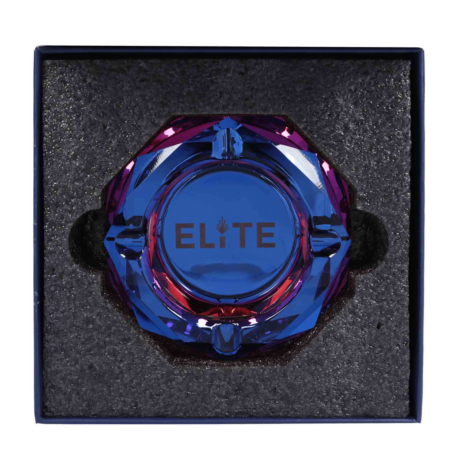 A top-down view of the Blue Elite Crystal Ashtray, showcasing its circular, translucent blue design against a dark background.