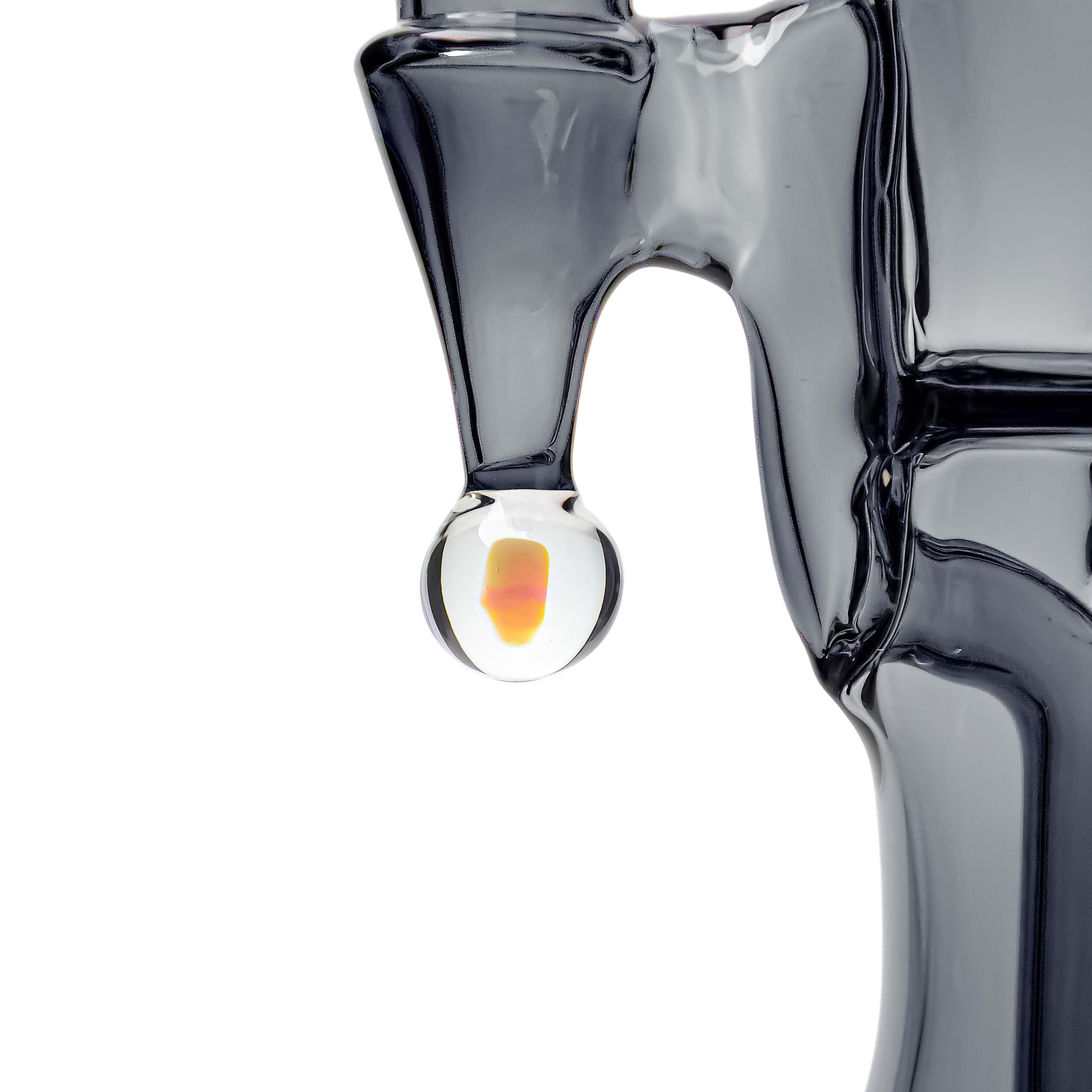 Close-up view of the COLORED OPAL SHOWERHEAD RECYCLER, showcasing its clear glass construction and unique opal detail.