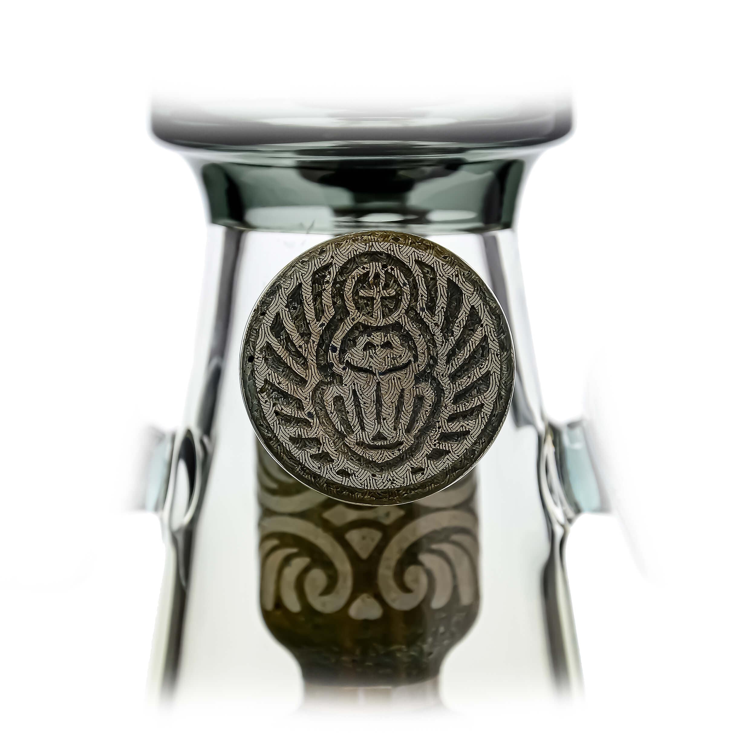 A close-up, angled view of the ETCH DAB RIG-V4| showcasing the detailed etching on its glass body.