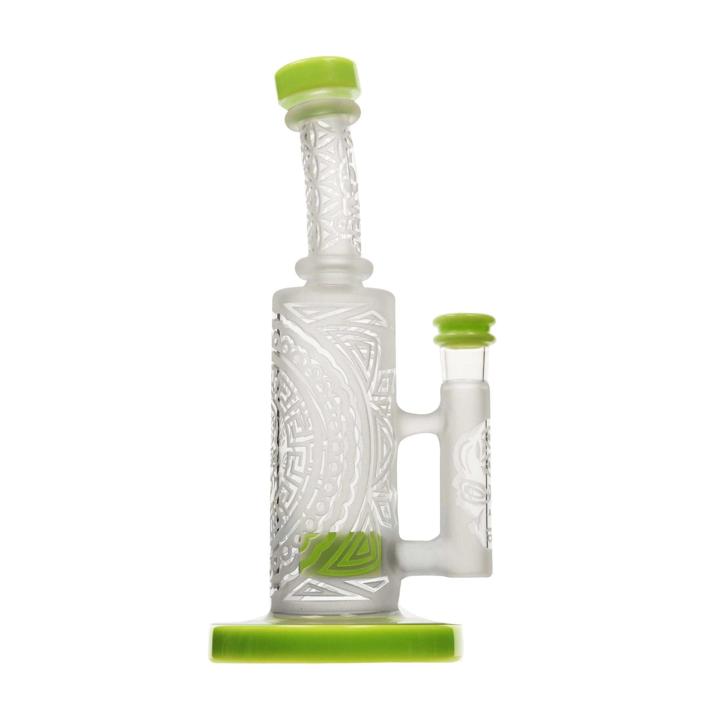 Front view of the SANDBLASTED MINI STRAIGHT CAN, featuring a sandblasted pattern on clear glass, resting on a solid green surface.