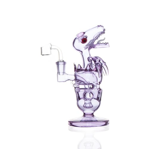 Front view of the FAB DINO, a clear glass sculpture resembling a dinosaur with a rounded base and curved neck.