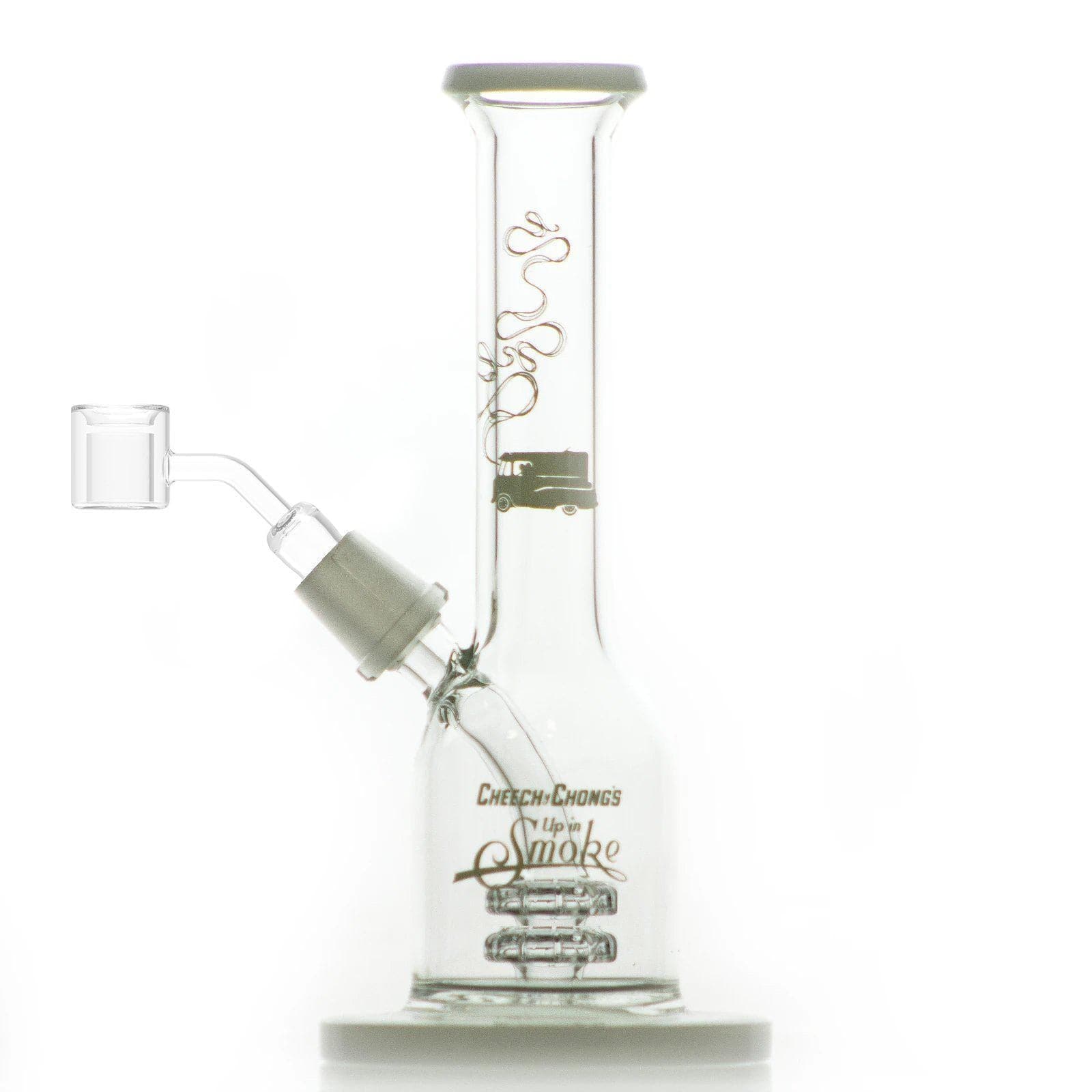 A studio shot of the Jade East 7" Dab Rig, showcasing its clear glass construction and downward-facing joint.