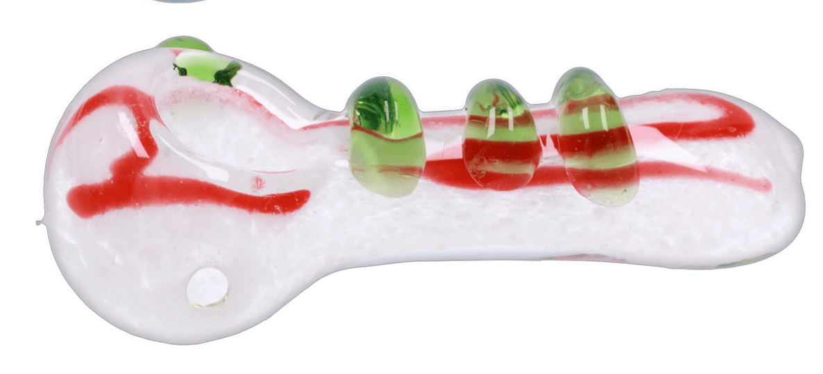 Top-down view of the DHC 3-inch Glass with Drips Hand Pipe showing a white glass body with red swirl accents and three raised green drip knobs.
