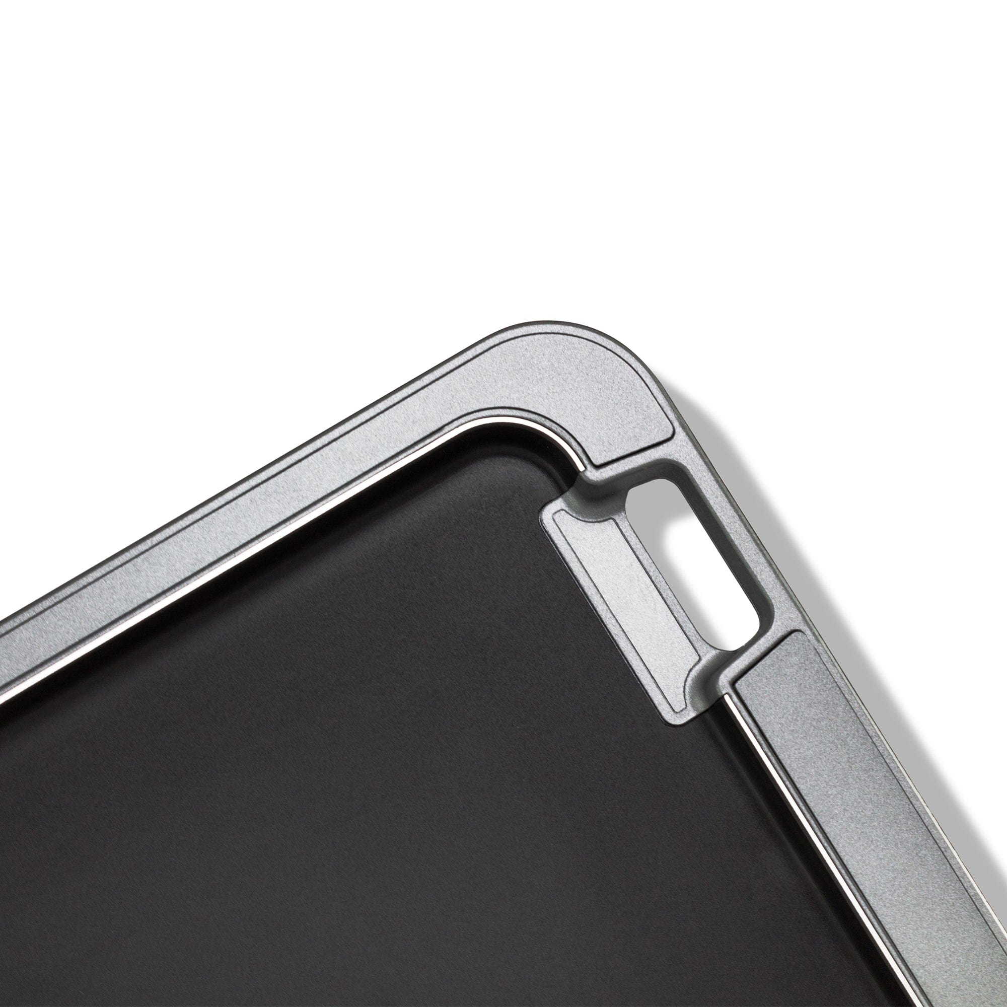 Close-up, angled view of the M.L.T.9 Portable Rolling Tray Survival Kit, showing its metal construction and compact design.