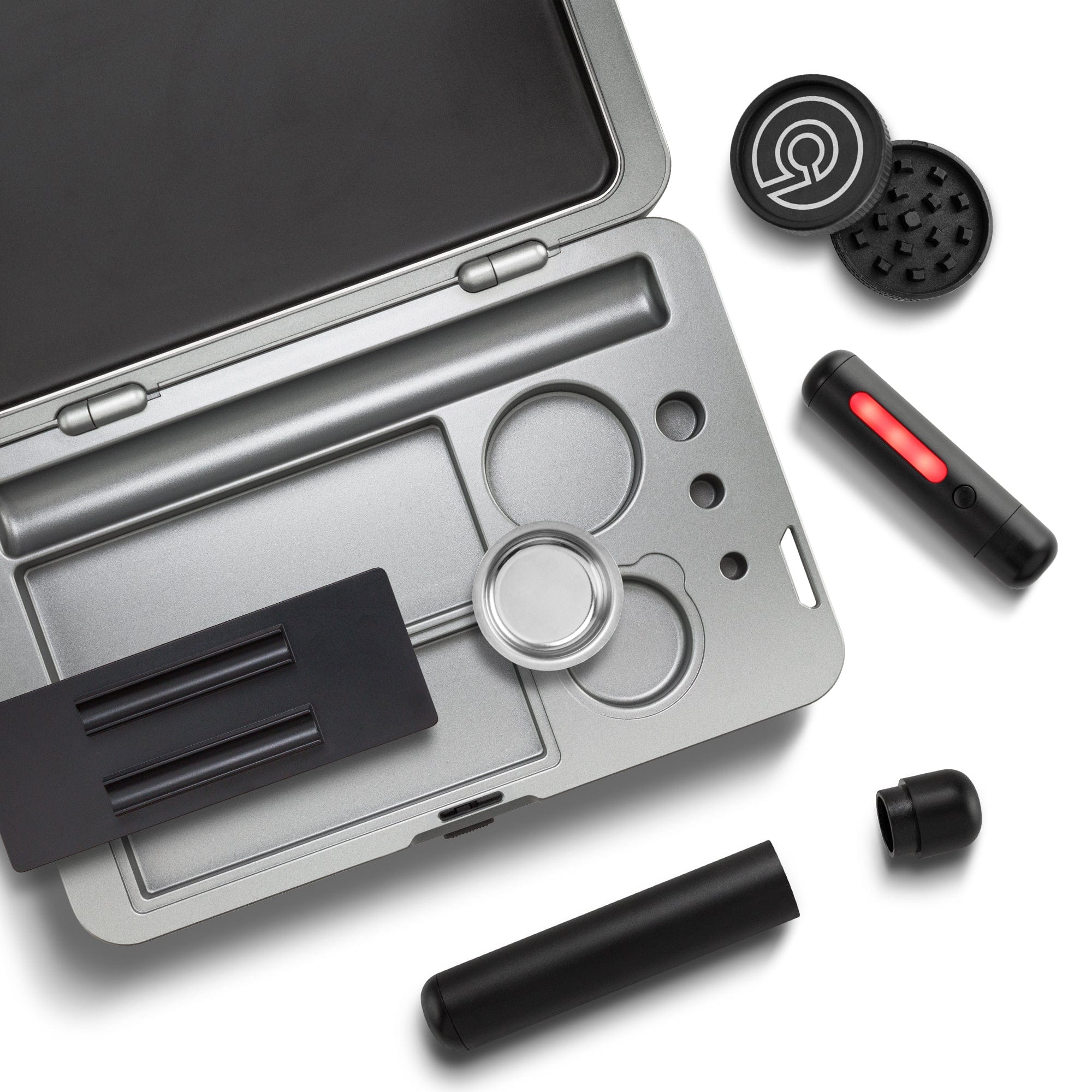 Overhead view of the open M.L.T.9 Portable Rolling Tray Survival Kit, showcasing its black interior and included accessories on a white surface.