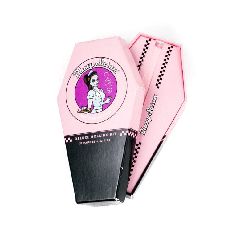 Angled view of the pink Blazy Susan Pink Rolling Paper Coffin Kit with one lid propped open to show the matching pink interior and black base.