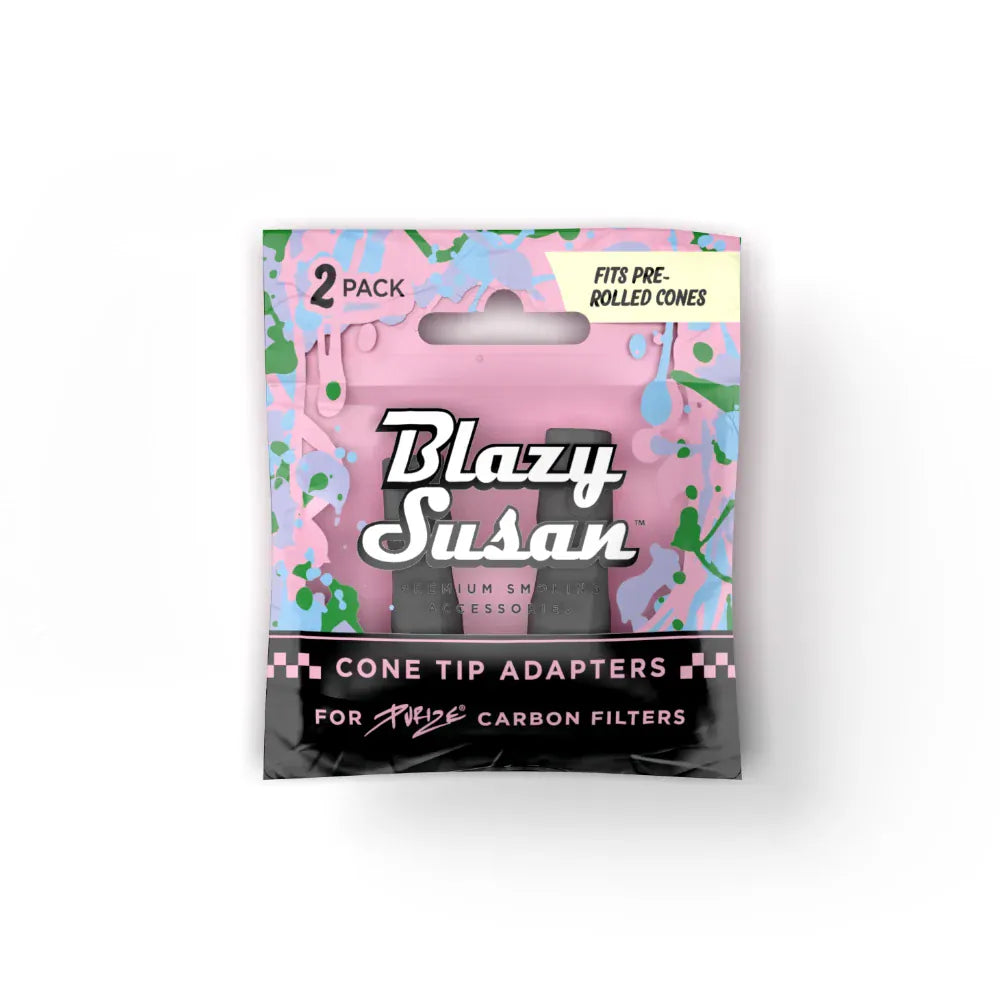 Front-facing shot of a pink and black display pouch labeled "Blazy Susan Purize Cone Tip Adapters" with colorful splatter graphics and a clear window showing two black adapters.