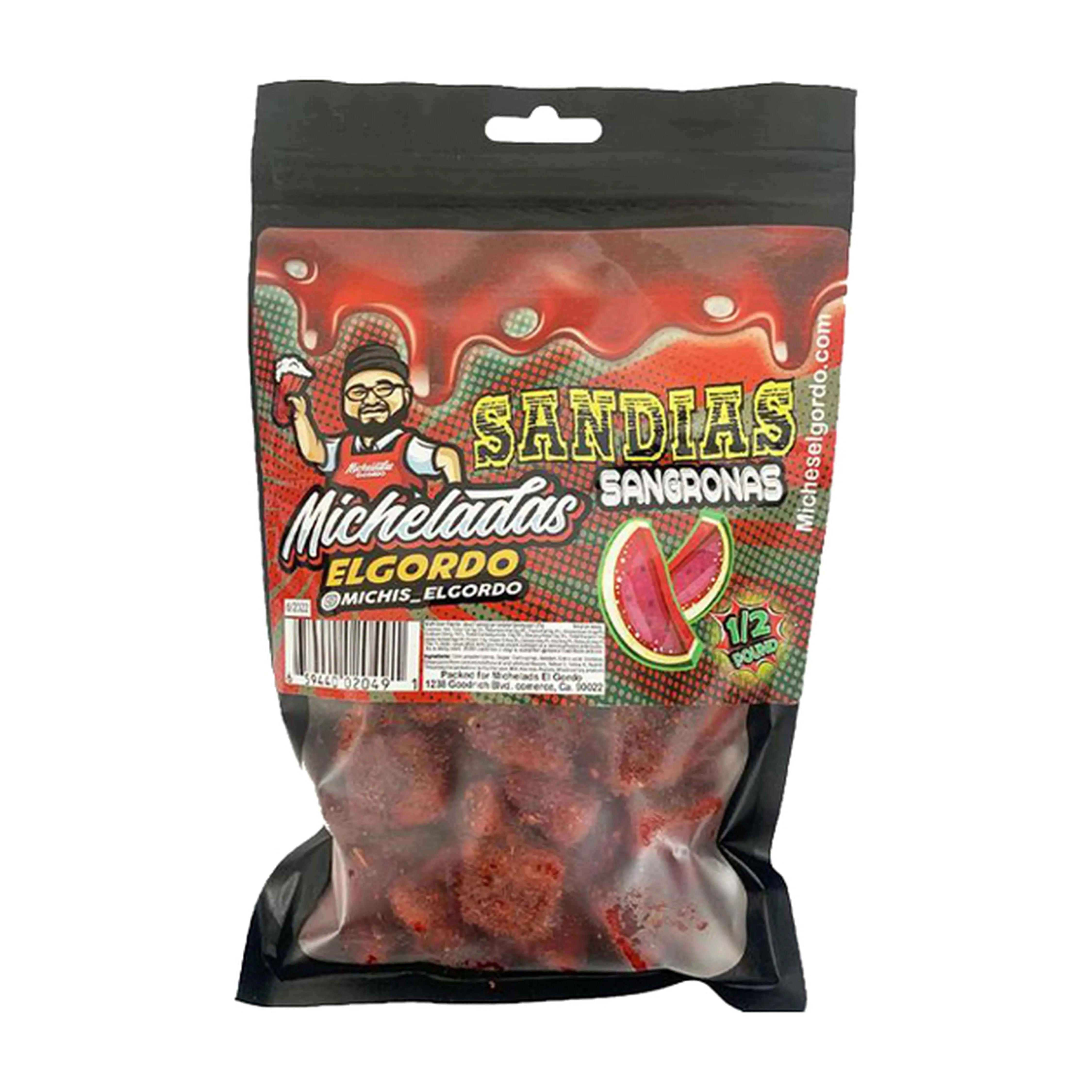 Close-up front view of the colorful pouch labeled Micheladas El Gordo Sandias Sagronas - 8 oz., showing the red watermelon graphics and clear window.