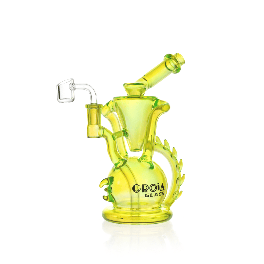 Front three-quarter view of the Croia Glass 10" Dragon Spine Recycler Dab Rig in translucent lime glass against a white background.