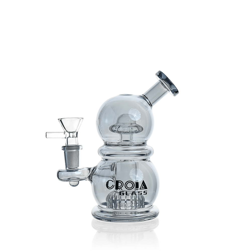 Front view of the Croia Glass 6" Mini Egg Dab Rig with Crown Perc showing clear double-bubble glass, angled mouthpiece, side bowl, and reflective white background