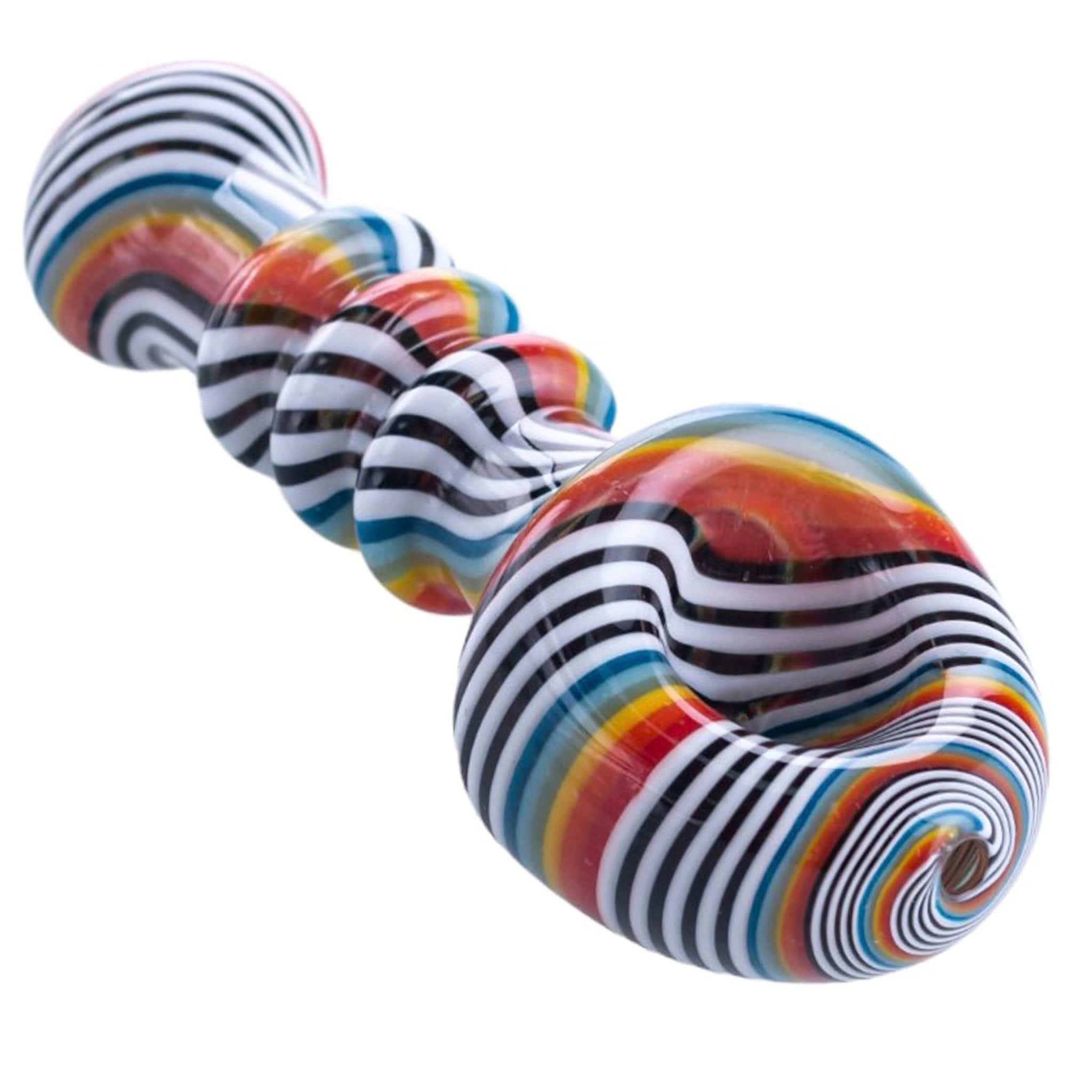 A studio shot of the Shovel Head Spoons, showcasing a colorful, spiraled glass spoon pipe against a plain white background.