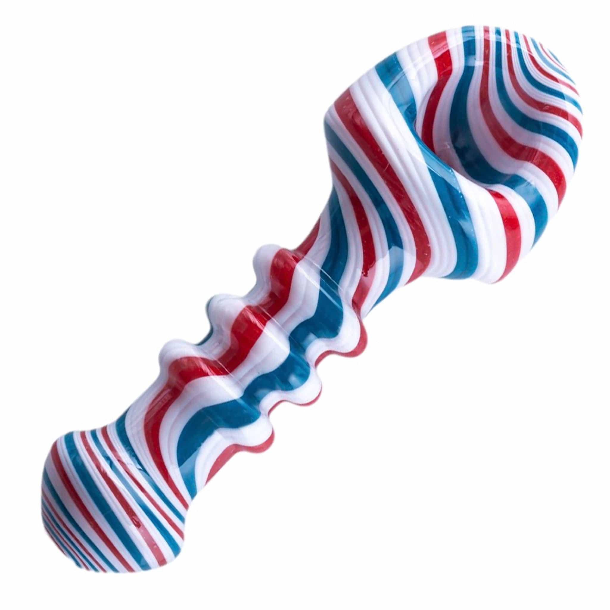 A close-up, angled view of the Shovel Head Spoons, showcasing the colorful, swirled glass design.
