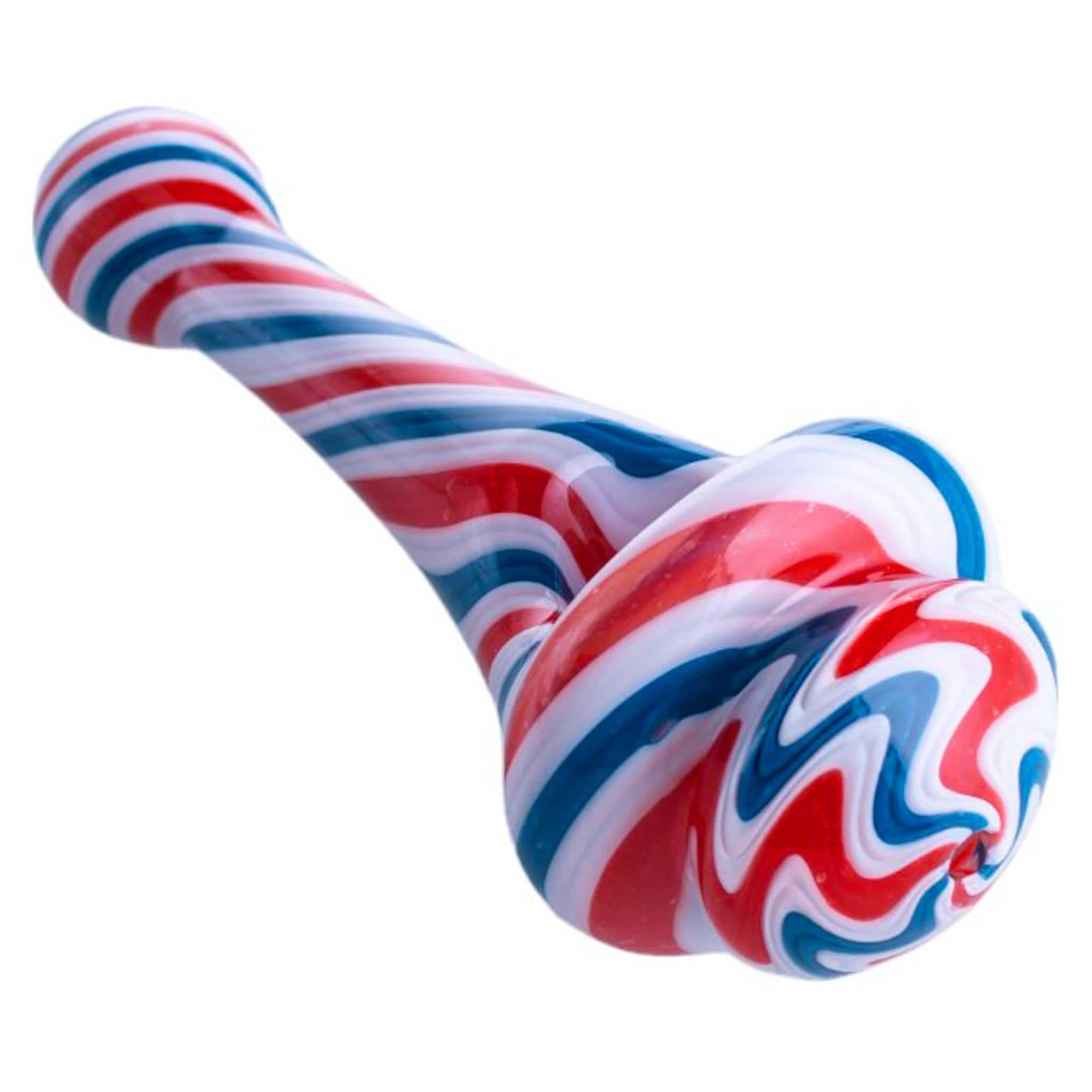 Close-up angled view of the red, white and blue Spinning Top Pipes showing twisted, glossy striped glass against a white background.