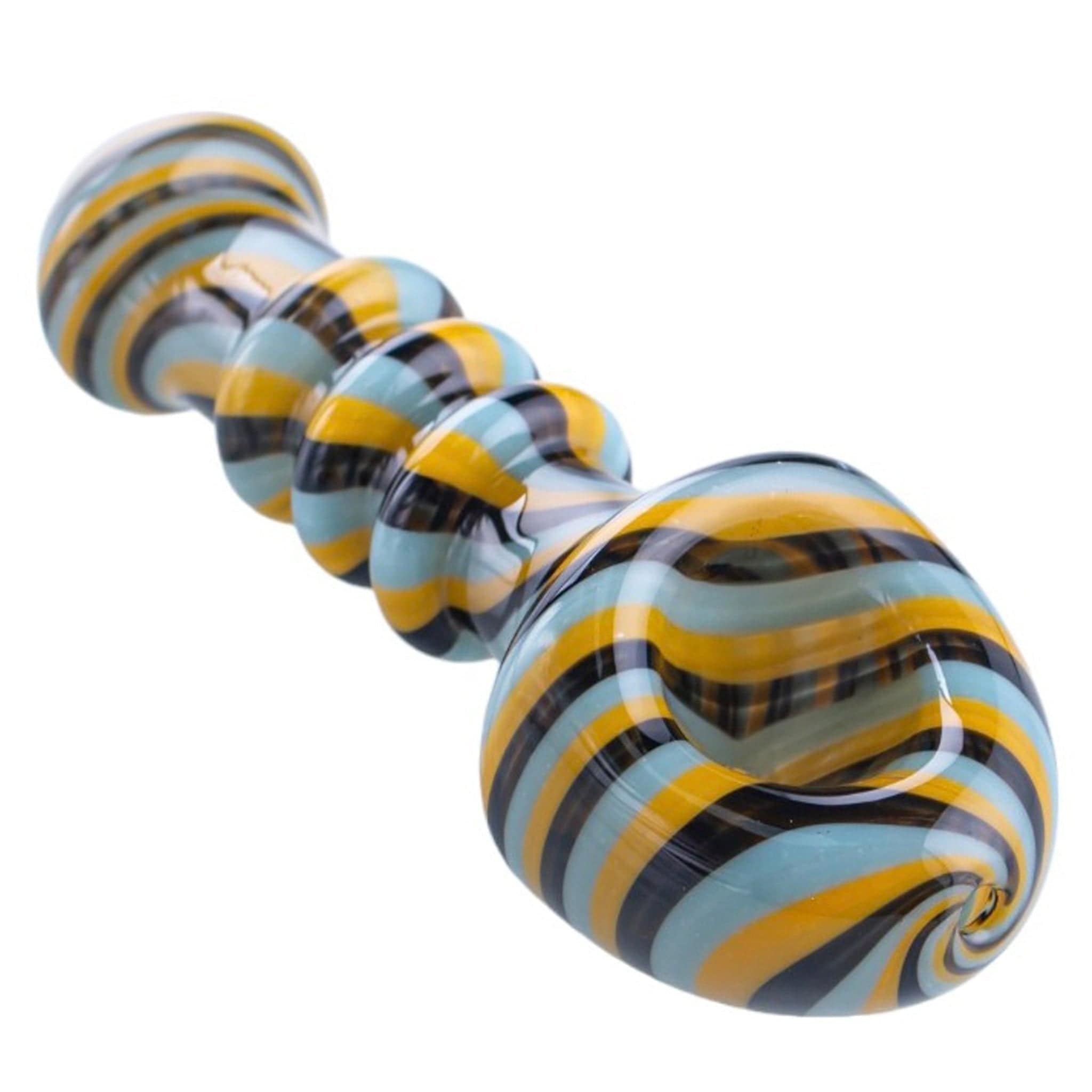 A close-up, angled view of the Shovel Head Spoons, showing a patterned glass pipe with a rounded bowl.