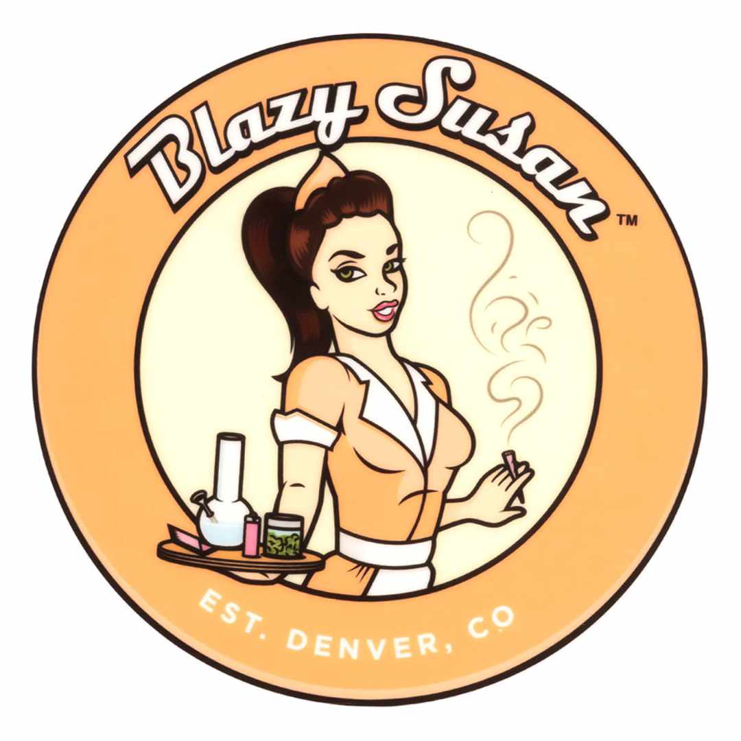 Circular logo-style illustration showing a retro waitress holding a tray with smoking accessories, featuring the Blazy Susan 8" Silicone Tray Mat.