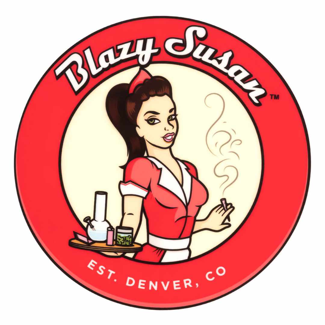 Round logo showing a retro waitress holding a tray and joint, featuring the Blazy Susan 8" Silicone Tray Mat name in the red border.