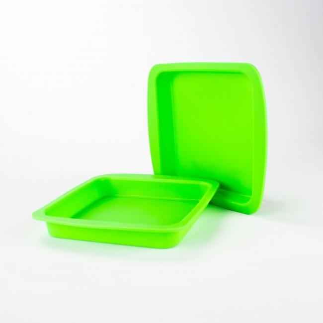Green silicone concentrate container with lid open.