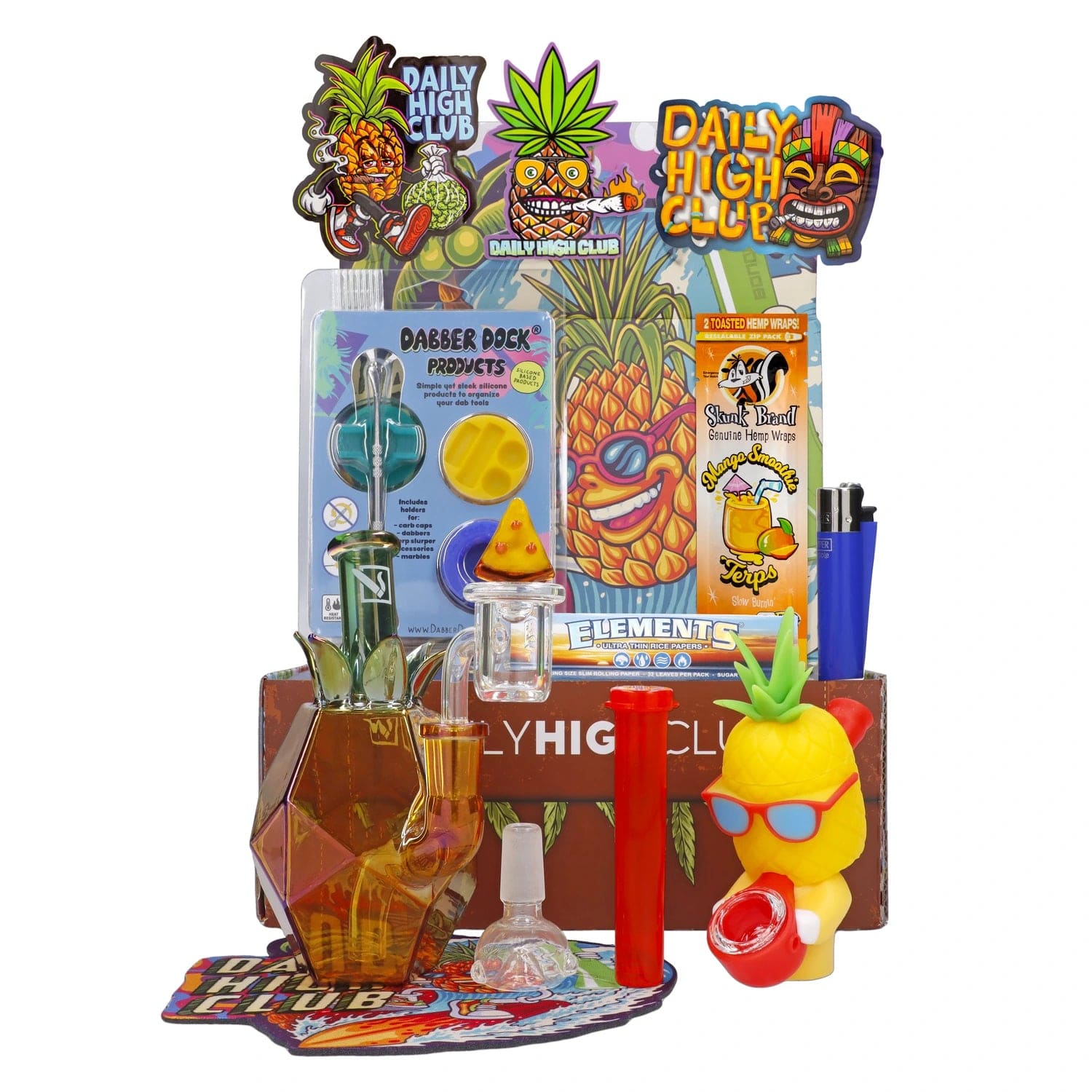 A brightly lit, angled view of the “Party Pineapple” Smoking Box with branded packaging and colorful accessories, all on a patterned surface.