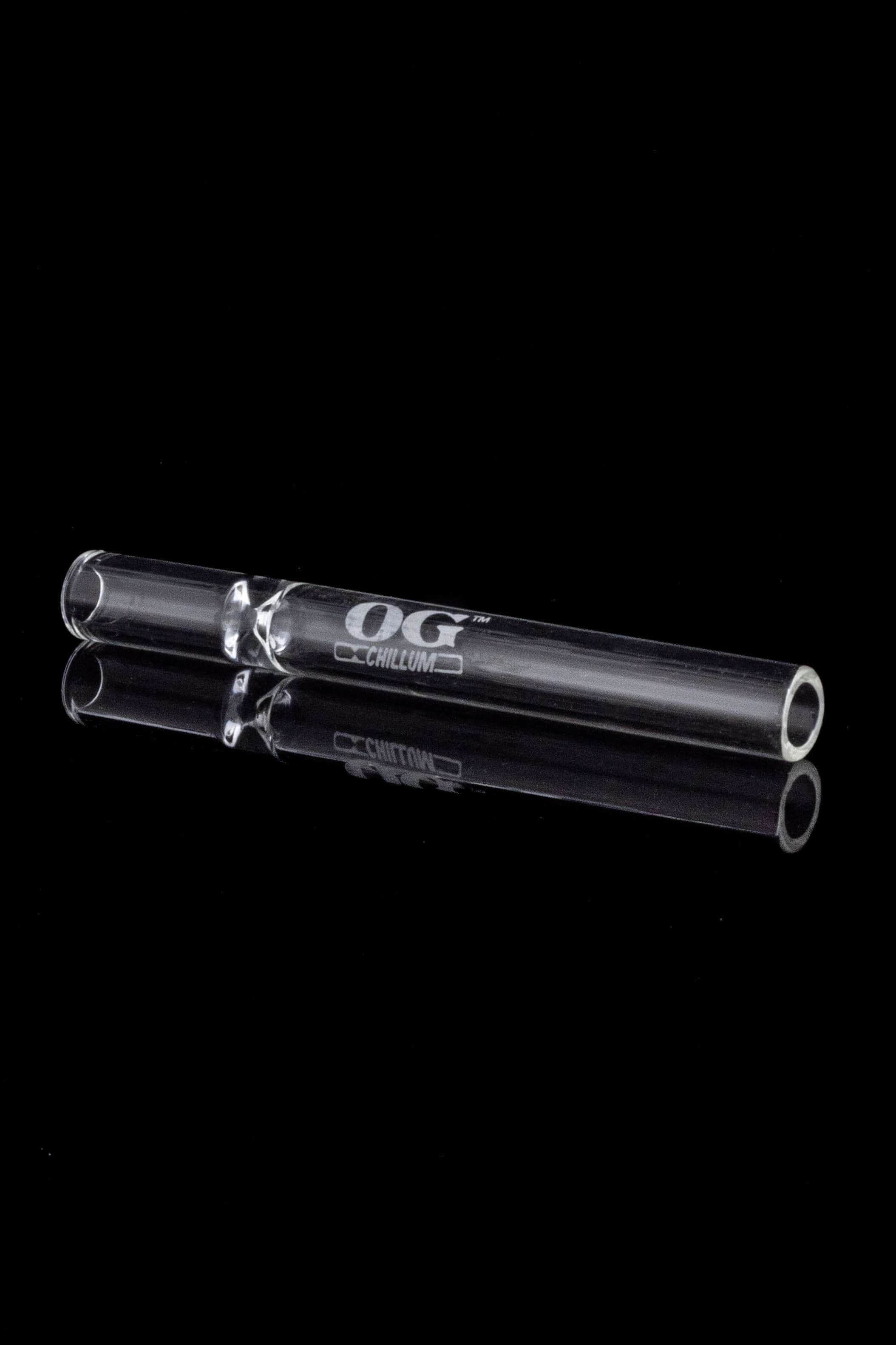 A close-up shot of the OG Clear Chillum, showing its simple glass tube design against a black background.