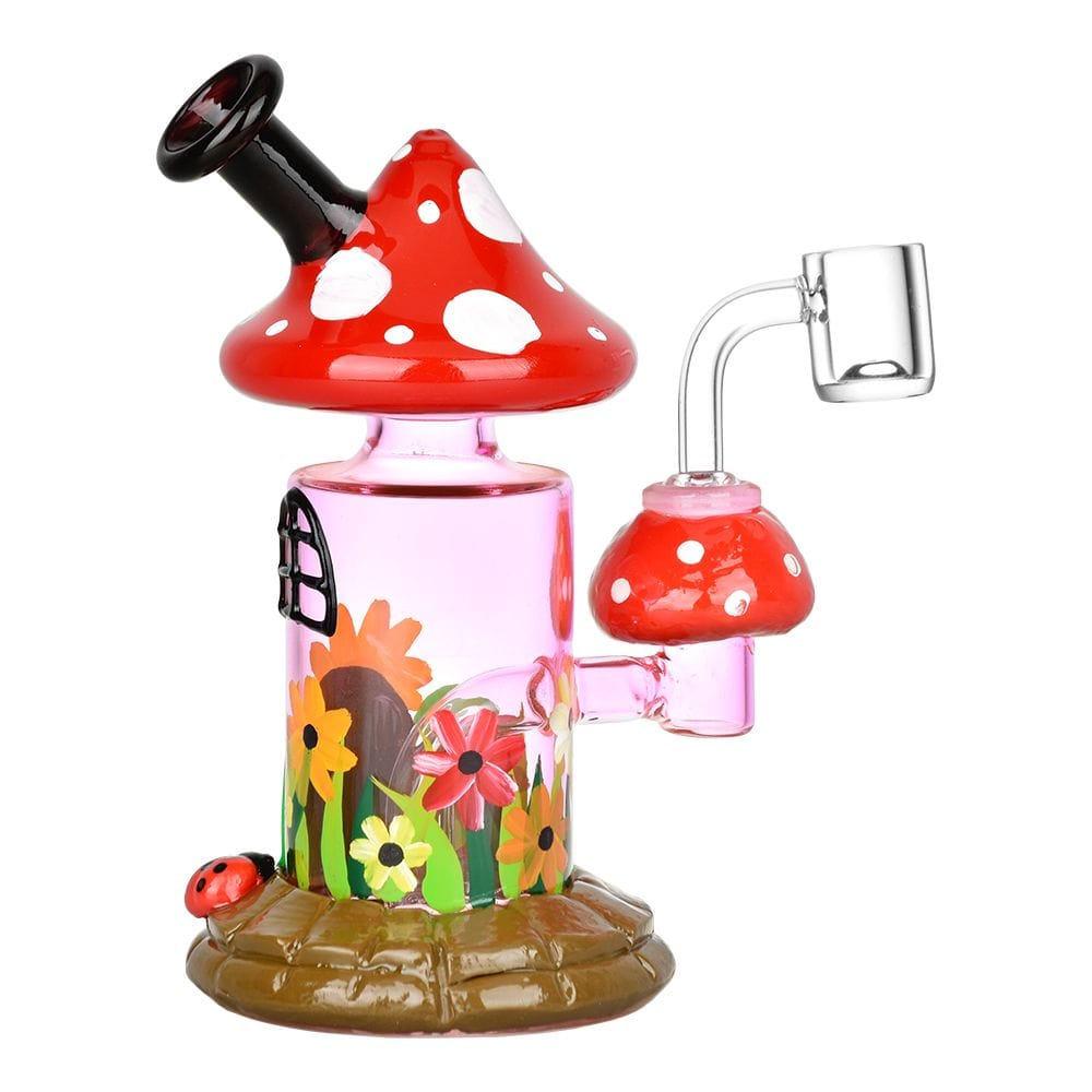 Front view of the Magic Shroom Garden Glow In The Dark Glass Dab Rig, shaped like a red mushroom with a clear glass stem and base.