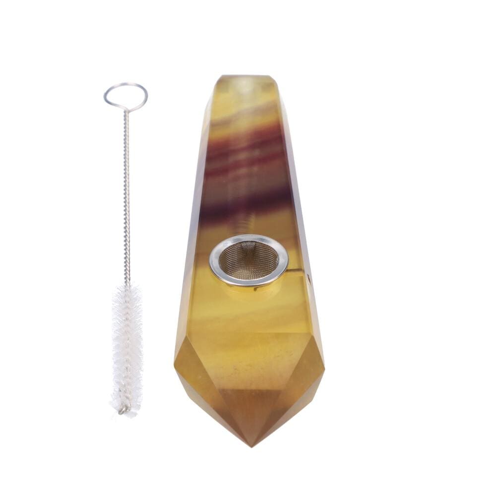 A close-up, angled view of the Crystal Hand Pipe, showing a light-colored, tapered glass form.