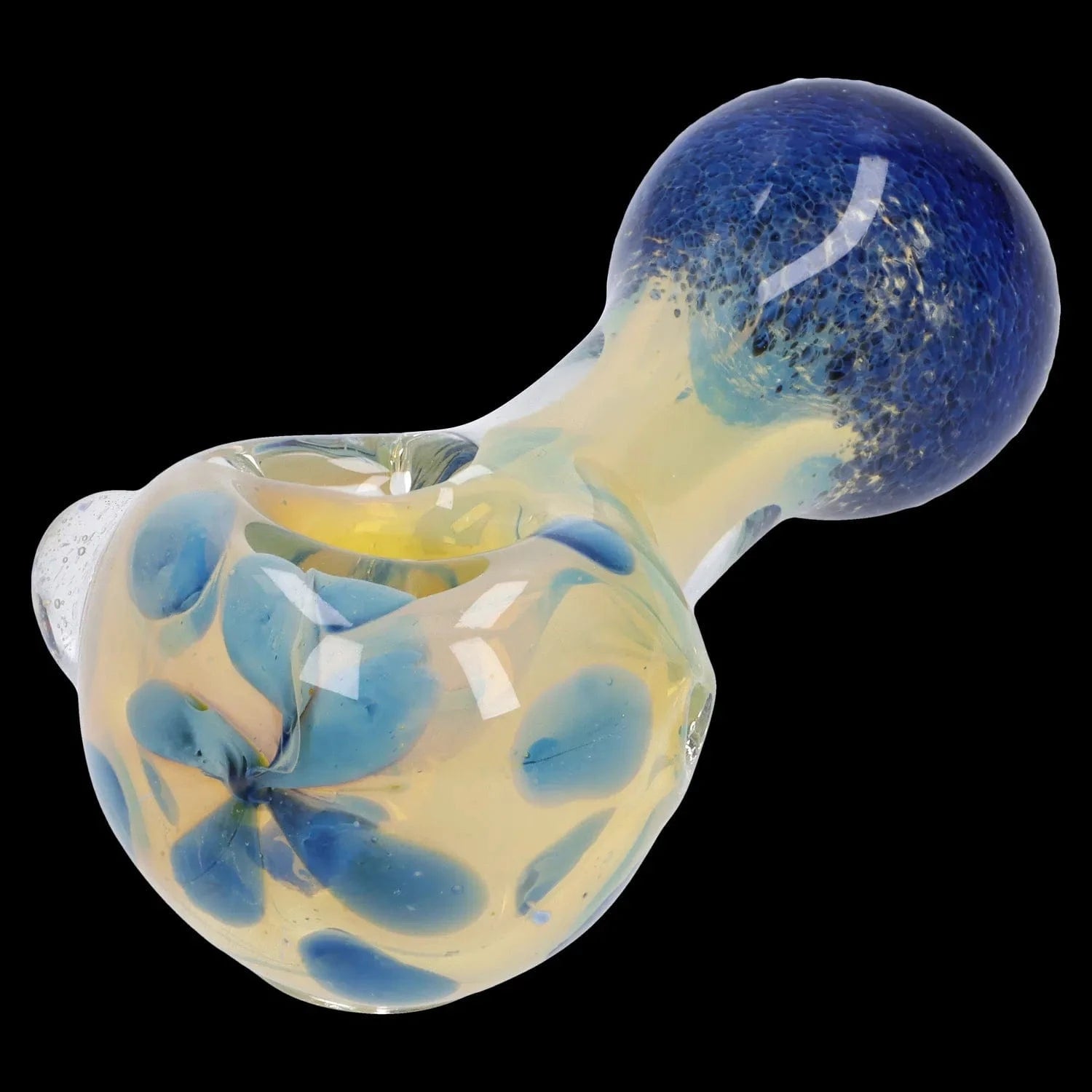 Close-up angled shot of the Gold and Frit Spoon Pipe - 4 in showing its rounded blue-speckled head and yellow glass body with blue petal-like frit against a black background