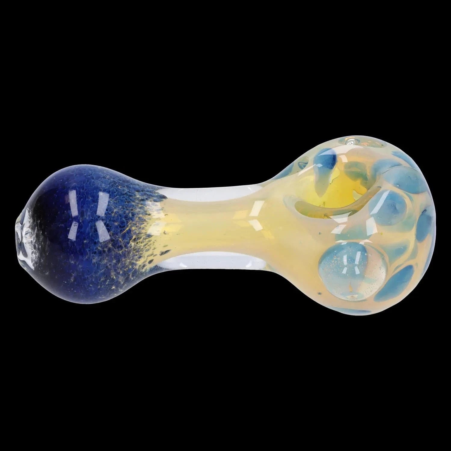 Top-down close-up of the Gold and Frit Spoon Pipe - 4 in, showing a blue rounded bowl fading to a translucent yellow body with raised blue frit dots on a black background