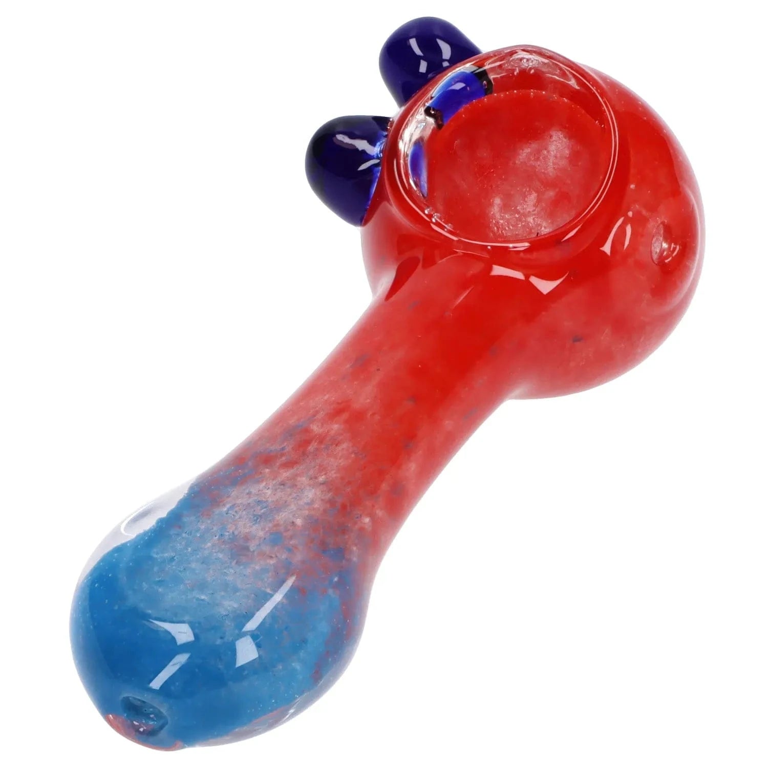 Angled close-up of the Gradient Glass Frit Pipe - 3.5 in showing its red bowl transitioning to a blue rounded mouthpiece with two dark blue glass knobs.