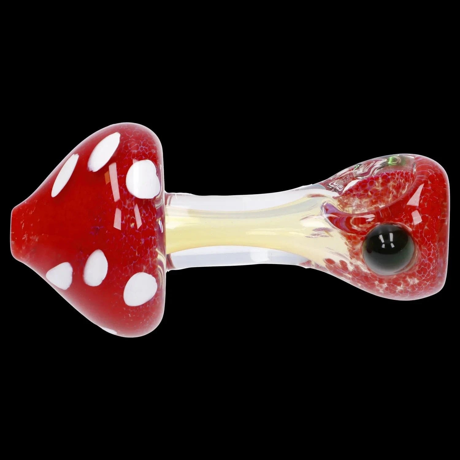 Side profile of the Mushroom Frit Spoon Pipe - 4.5 in showing a red, white-spotted mushroom bowl and clear stem on black.
