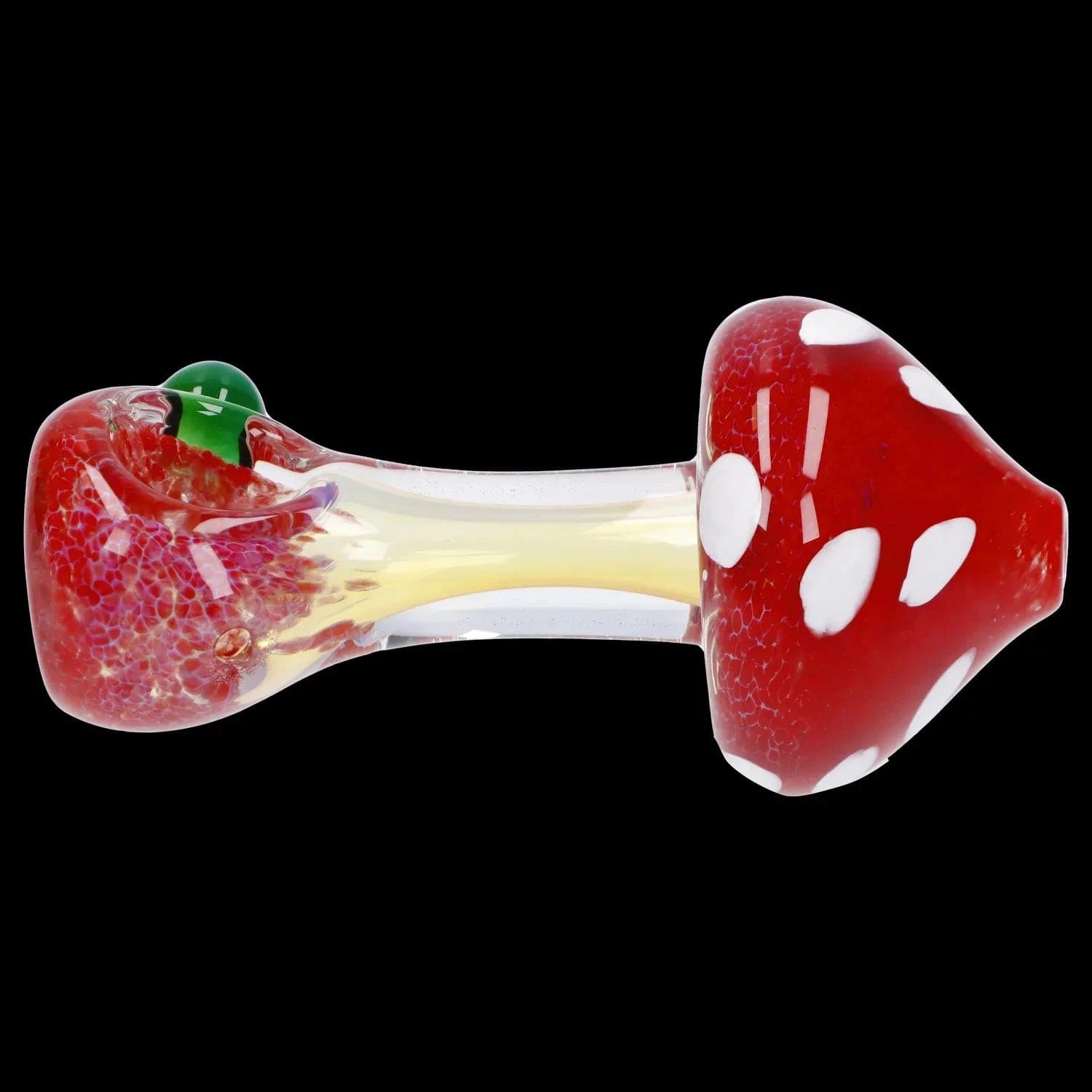 Side view of the Mushroom Frit Spoon Pipe - 4.5 in showing a red mushroom cap with white spots and a clear yellowish stem on black.