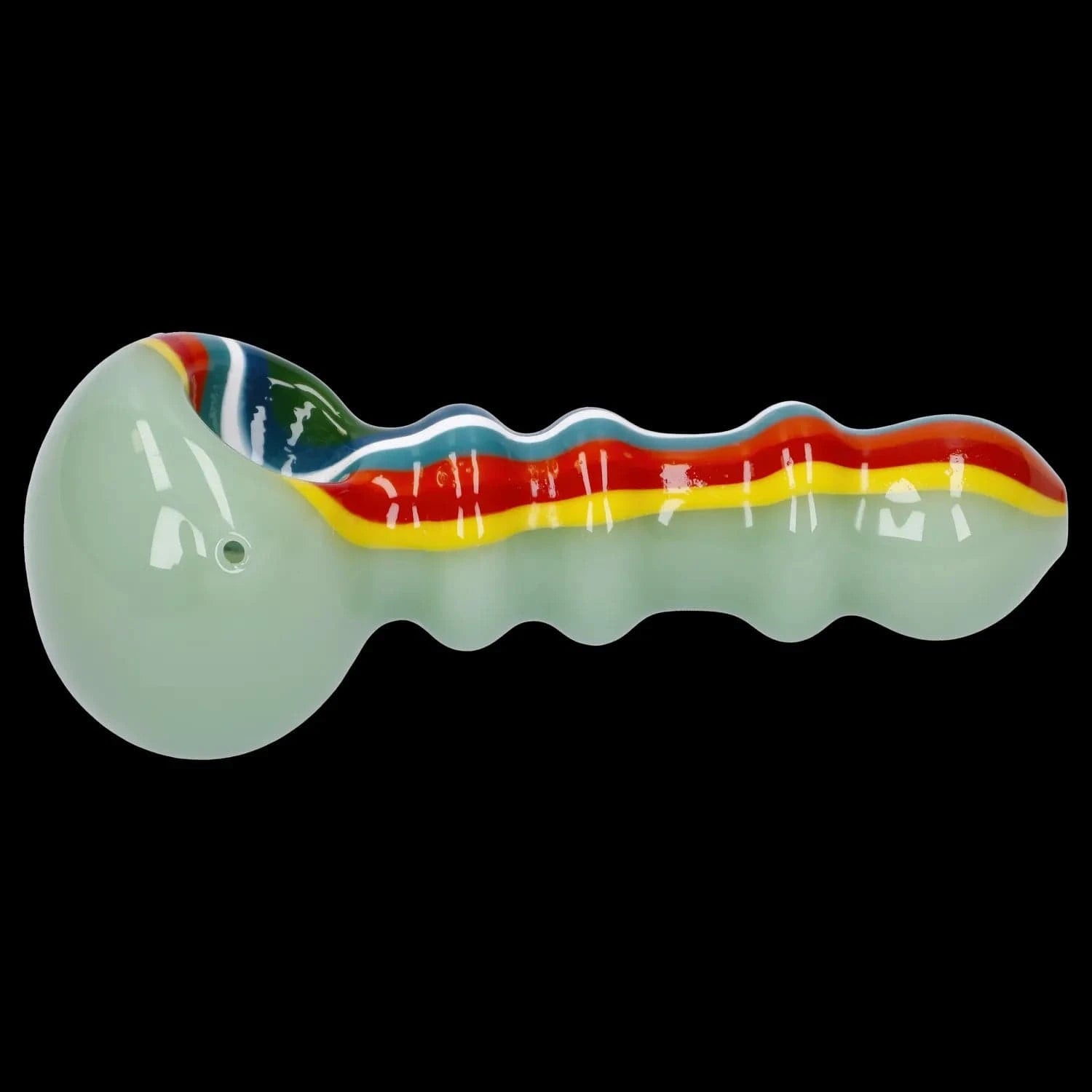 Side view of the Slime Rasta Rainbow Spoon Pipe - 4.5 in showing a pale green glass body with ridged handle and bright red, yellow and blue stripe accents.