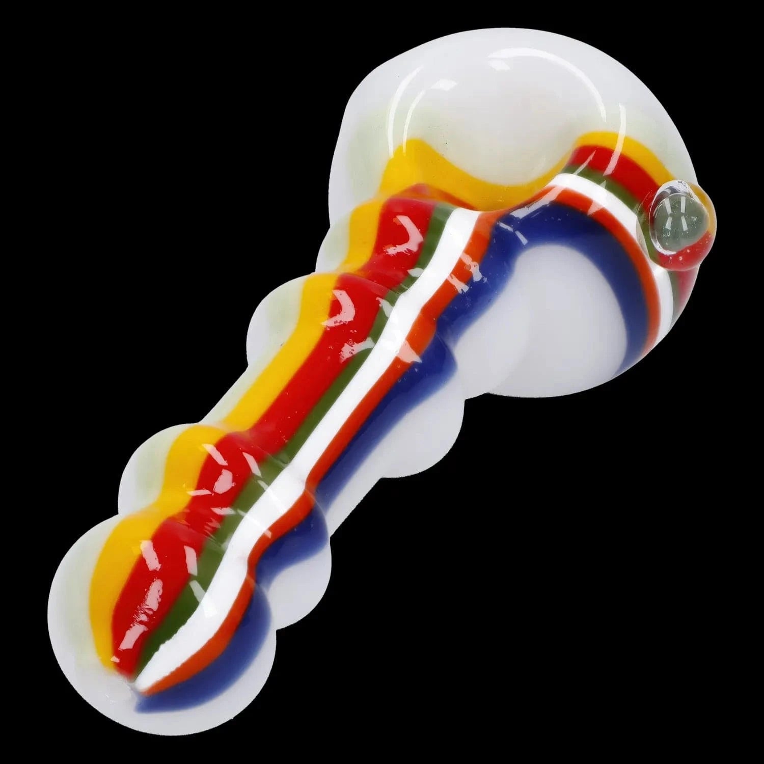 Angled close-up of the Slime Rasta Rainbow Spoon Pipe - 4.5 in showing glossy white glass with raised scalloped edges and red, yellow, green, blue and orange stripes against a black background