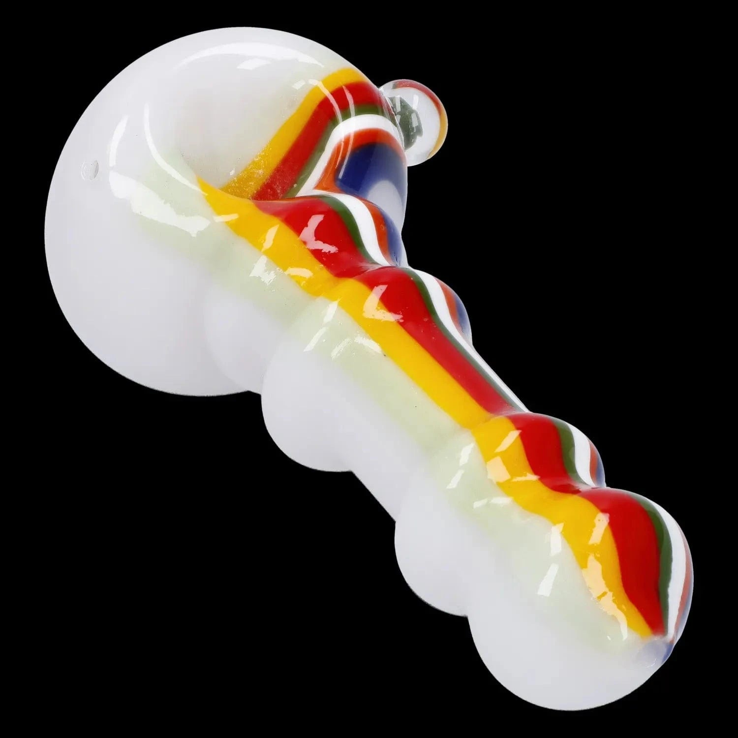 Angled close-up of the Slime Rasta Rainbow Spoon Pipe - 4.5 in showing a white glass body with raised multicolored rasta stripes against a black background
