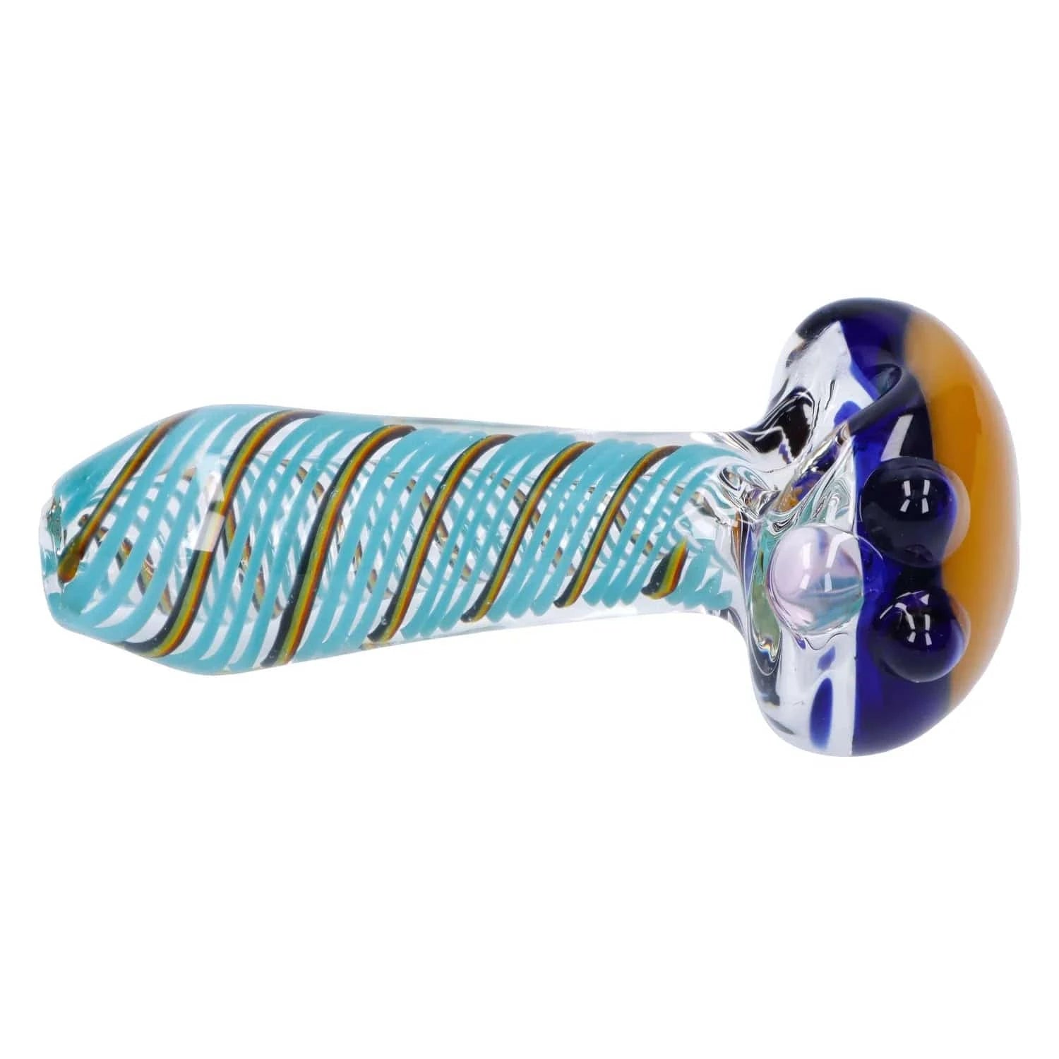 Close-up side view of the Swirling Double Blown Spoon Pipe - 4.5 in showing blue spiral cane patterns along the clear glass body and a rounded amber and cobalt bowl with glass marbles.