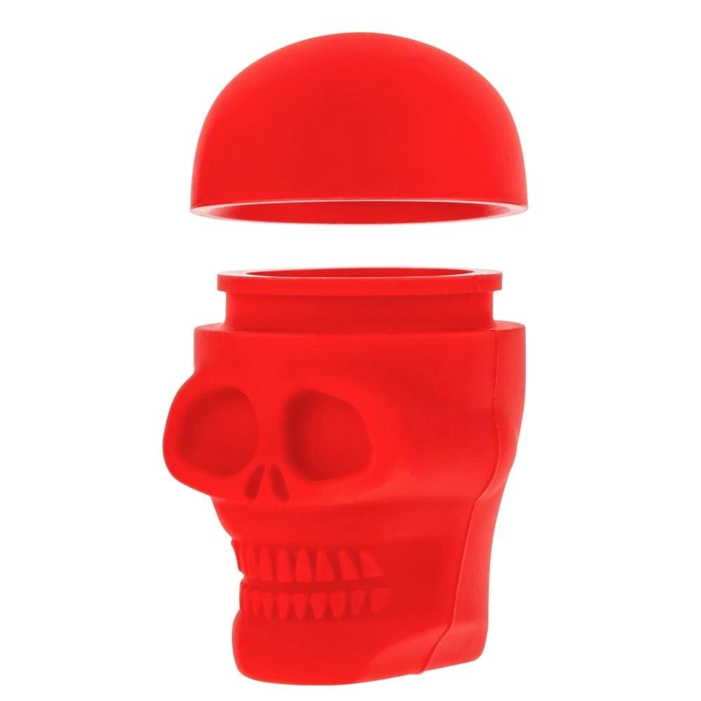 A close-up shows the Silicone Non-Stick Stash Container  Skull, a small, closed container with a skull design.