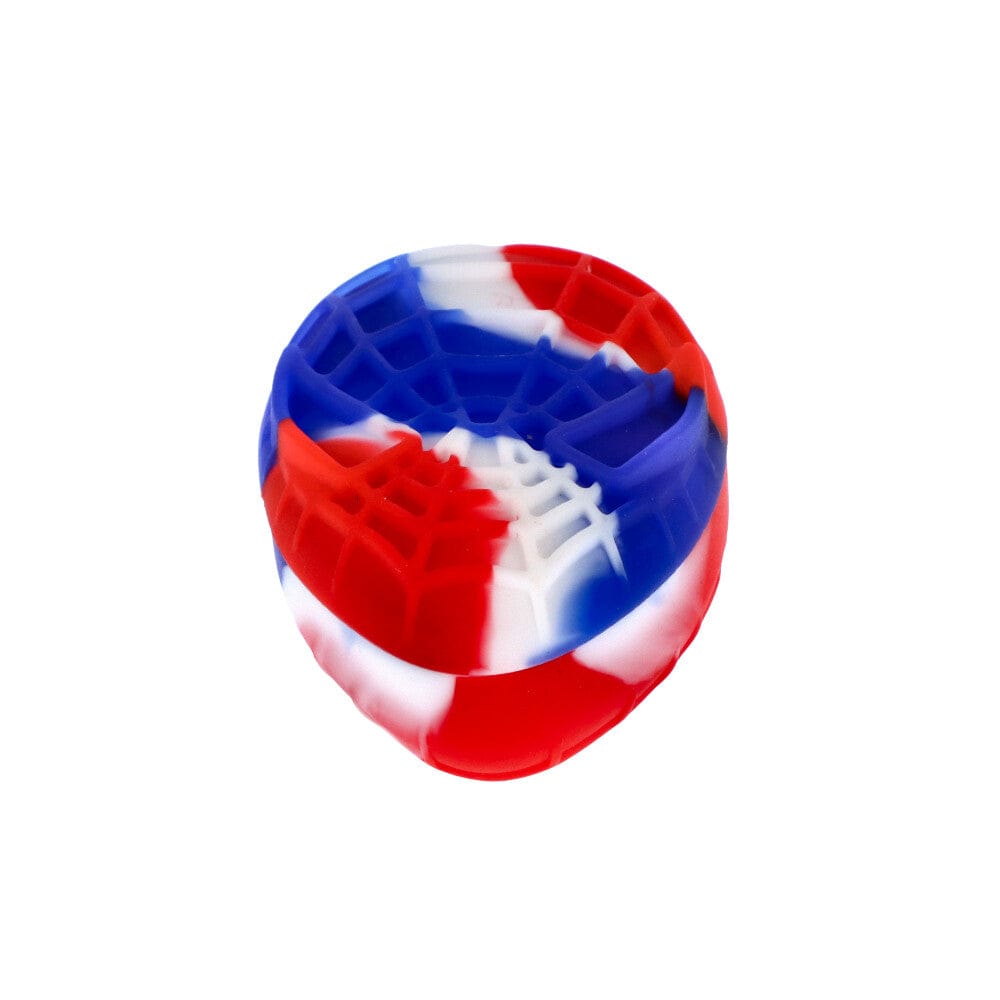 Top-down view of a red, white and blue Silicone Teardrop Container showing its textured, honeycomb-like interior and rounded teardrop shape against a white background.