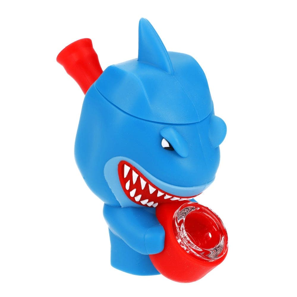 Front view of the “Angler Fish” Box, a blue, cartoonish sculpture with a red mouthpiece resembling an open mouth.