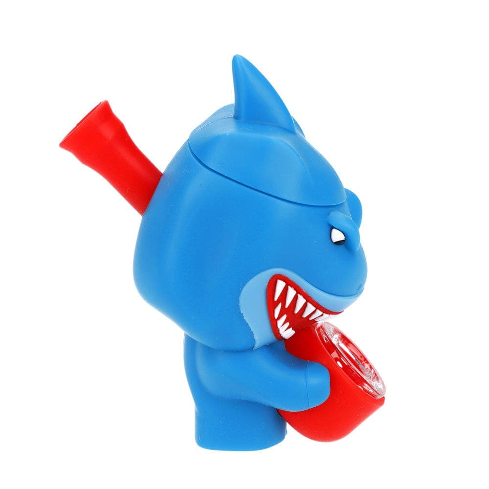 Side view of the “Angler Fish” Box, showcasing its sculpted, blue design with a red, fish-like mouthpiece.