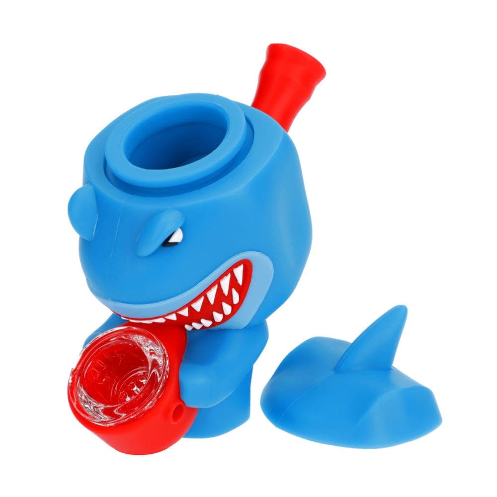 A three-quarter view of the “Angler Fish” Box, showing a blue, cartoonish sculpture resembling a fish with a red protruding joint.