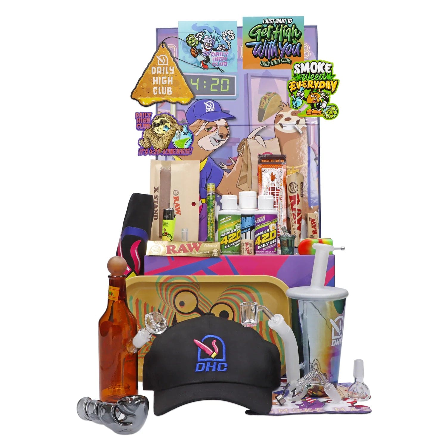 Front view of the “April 2024 Zaza Crash” Limited Edition Deluxe Box surrounded by various branded items, showcasing a colorful, eye-level arrangement.