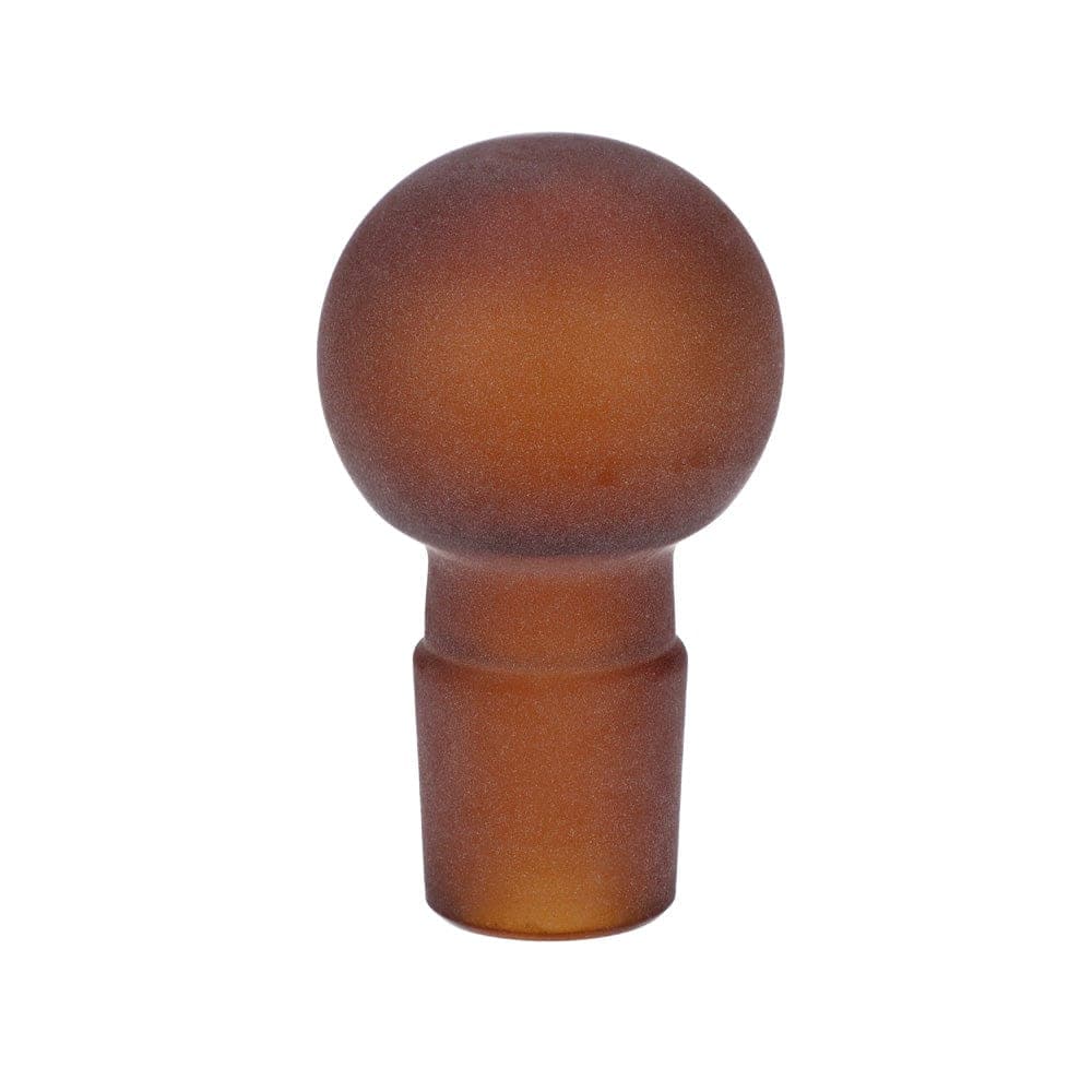 A front view of the “Hot Sauce” Smoking Box, showing a dark-colored, rounded glass piece with a cylindrical base.