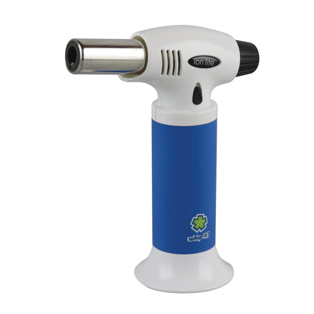 Front three-quarter view of a Whip-It! Ion Lite Torch Lighter showing its white top and blue grip, stainless nozzle, and small logo on a white background