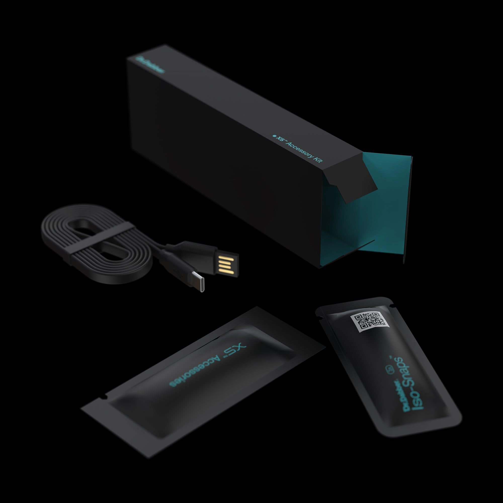 Angled close-up of a black and teal box and accessories for the Dr. Dabber XS™ on a black background.