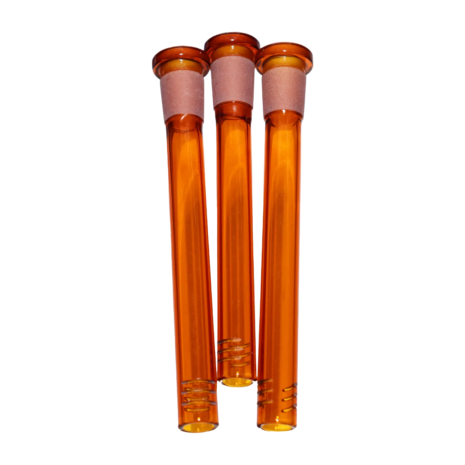 Close-up front view of three amber glass DHC Color Diffused Downstem - 5 in. pieces aligned vertically against a white background.