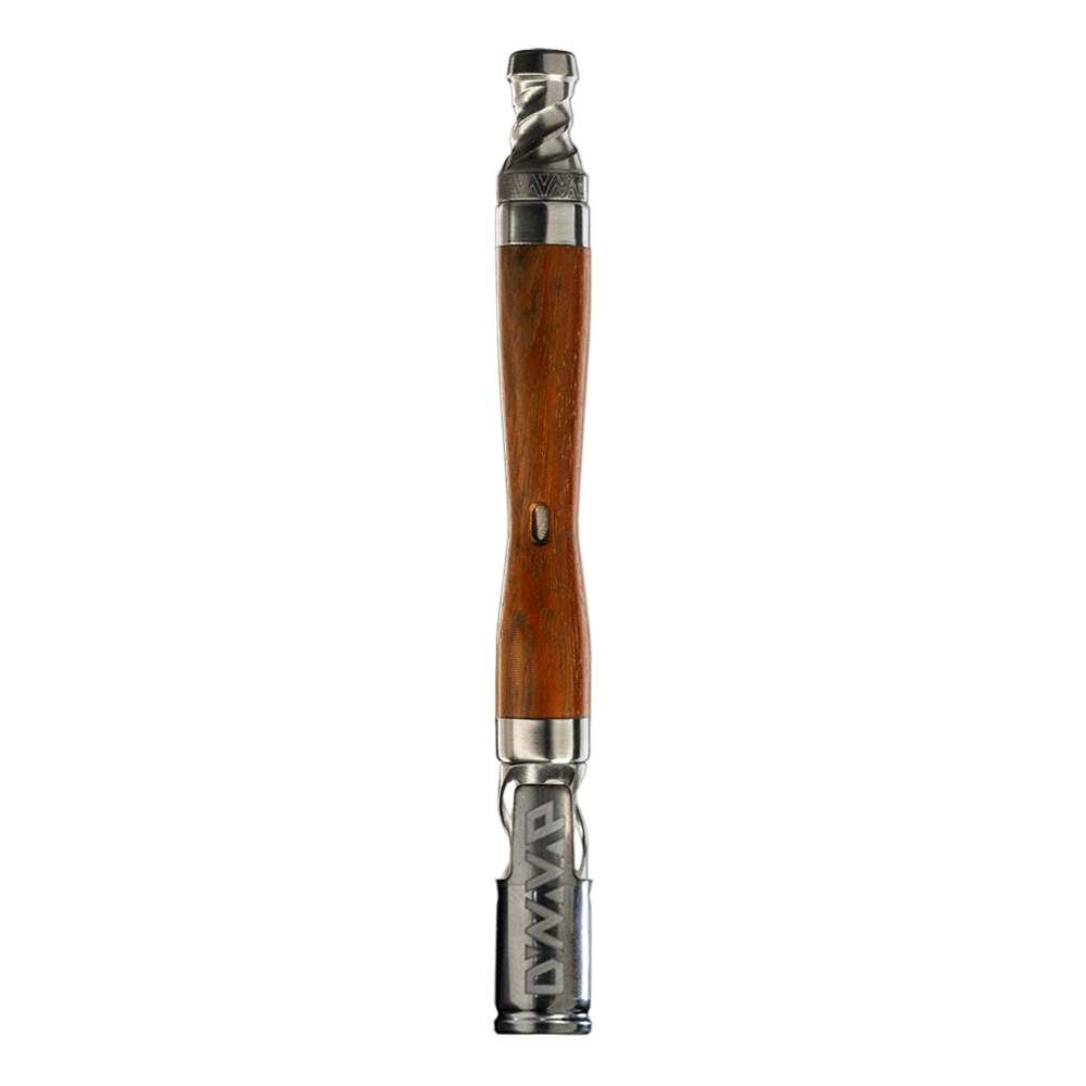 Close-up, side view of The WoodWynd, showcasing its smooth, dark wood grain and sculpted design.