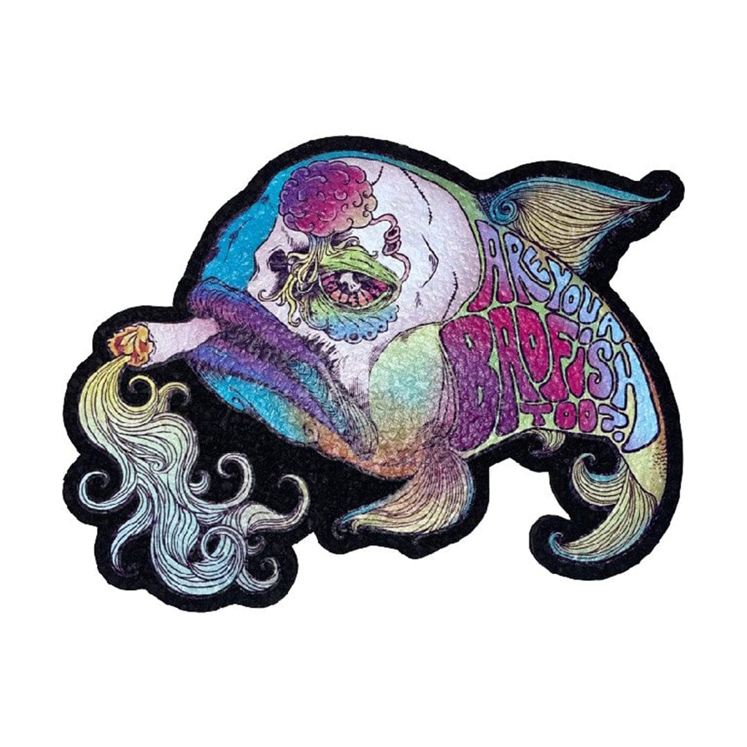 A detailed close-up of the 9" Dab Mats, showing a colorful, cartoon-like design with swirling patterns and a central focal point.